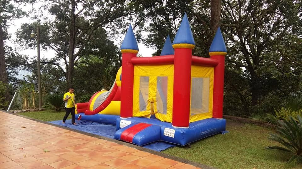 Bounce house set up on the lawn for a kids' party